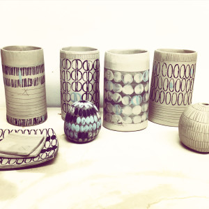 hand built clay pots decorated with slip inlay and stamps