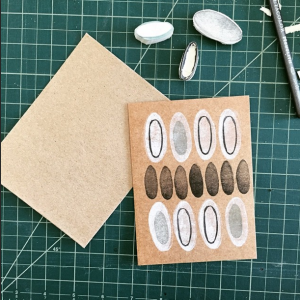 Making handmade rubber stamps and testing on paper